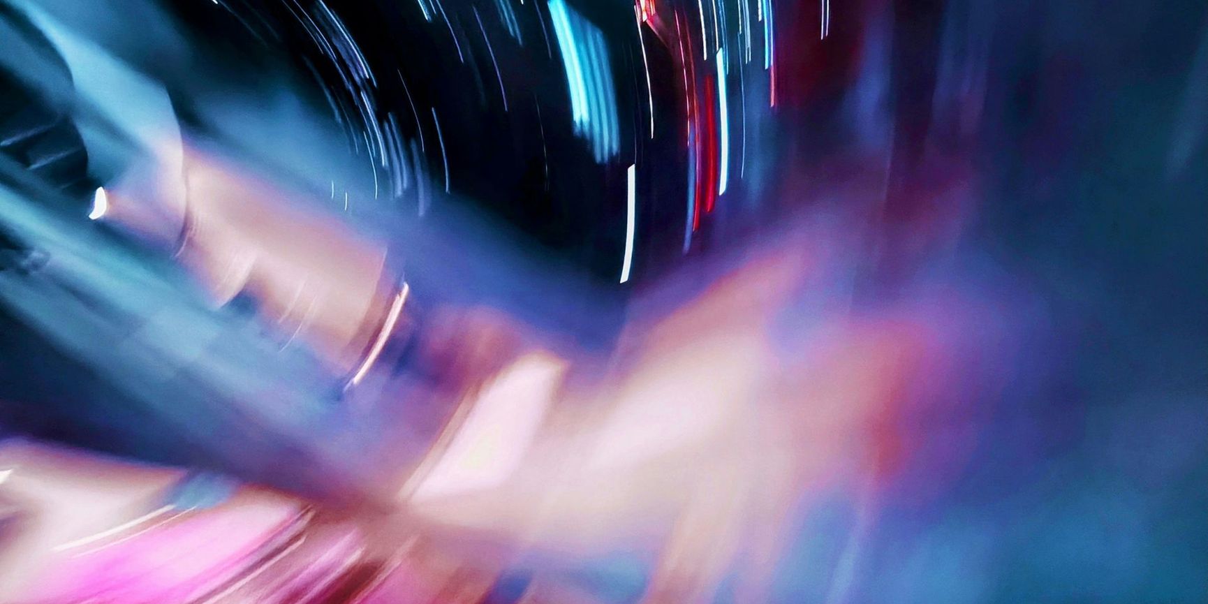 Motion blurred neon lights image