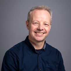 Headshot of Professor Adrian Hilton, Head of Creative AI, CoSTAR National Lab 