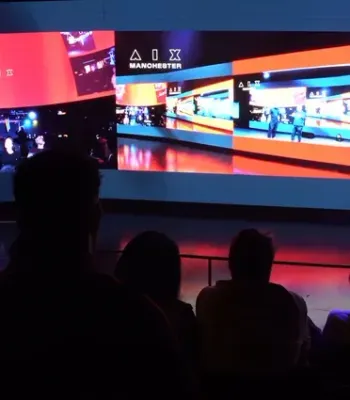 Audience members at a 5G multi-location Six Nations rugby watch party using immersive technology, hosted across Dundee, Salford, Cardiff and Belfast