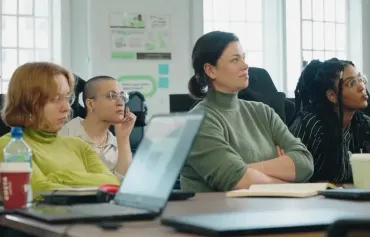 CoSTAR Ideate 2025 women in a classroom focussing on lecturer