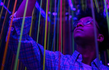Photo of a person pulling a string