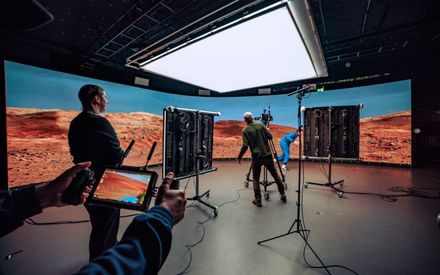 Interior of the CoSTAR Realtime Lab virtual production studio at Water's Edge, Dundee, showing the LED volume stage