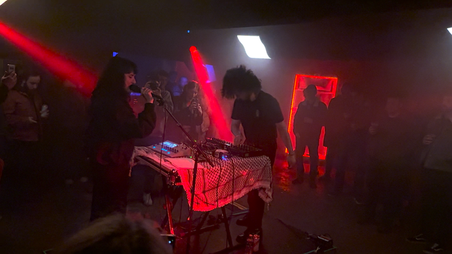 a man and woman performing at Invisible Wind Factory