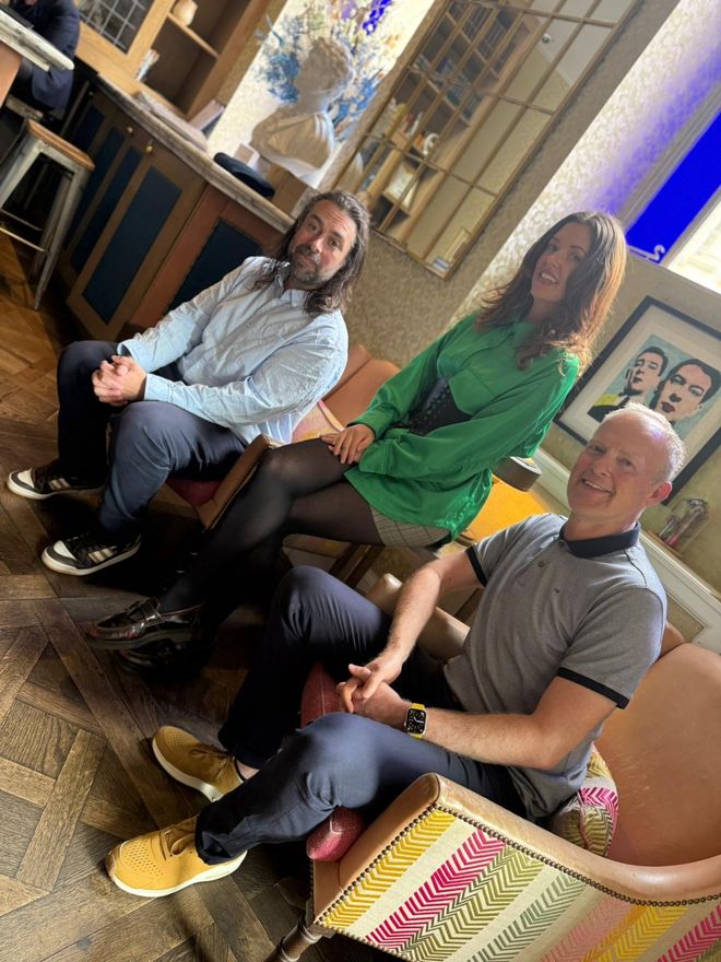 two men and a woman, Immersiv.es founders Iain Funnell (Co-Founder),Ben Dawson (Co-Founder), Ornagh Lynch (Co-Founder) sitting smiling at camera