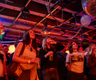 3 Girls dancing to indie music at a gig